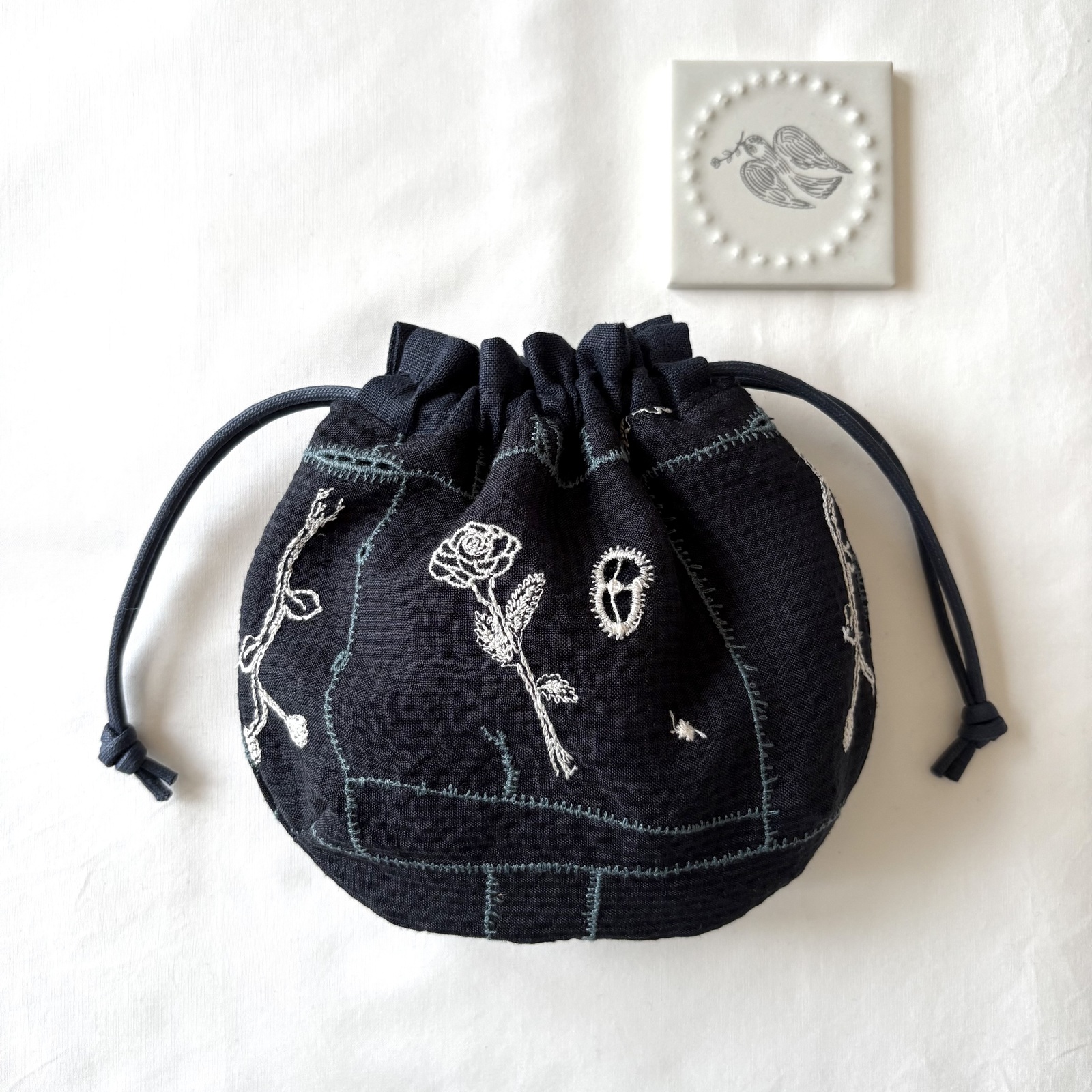 ミナペルホネン　あおりポケット巾着バッグ　ハンドメイド 500x0.jpg