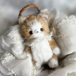 おっとり顔の茶白ねこさん