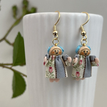 小さなお人形のピアス/イヤリング🩵💛🩵
