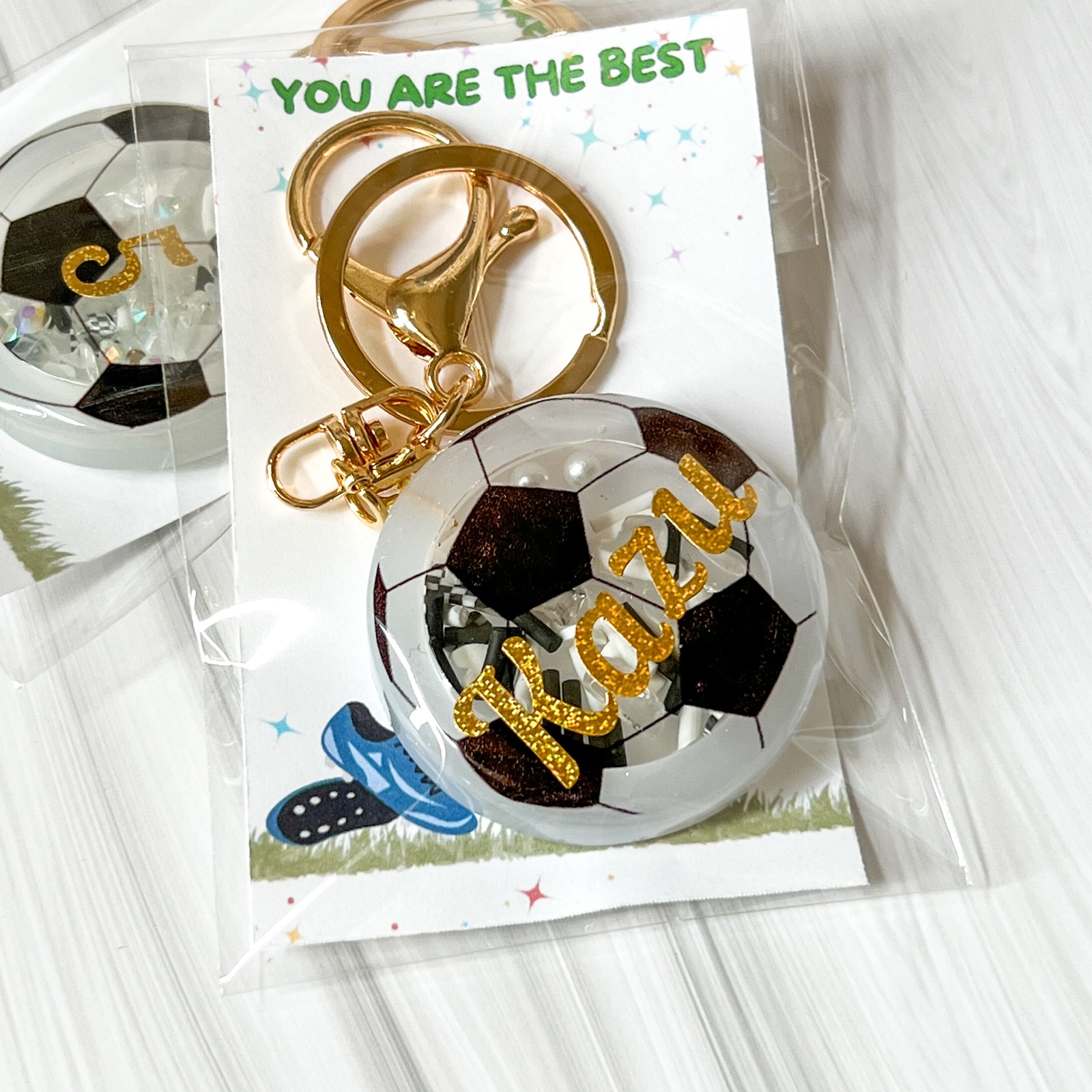 特別なストライカーへ！部活お守りシェイカーキーホルダー【背番号入り