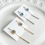 幻想のロングピアス ゆれるピアス イヤリング ノンホールピアス やさしい風 透明 月と太陽 ゴールド シルバー 揺れる 凛とした雰囲気を