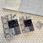 《受注製作》☑︎サイズ選択可　ほぼ日手帳カバー ミナペルホネン tambourine ベージュ◯ グレーにsmile flower のハギレをメインに片面チョコっとパッチカバー