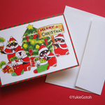 元気なペンギンたちの２つ折りクリスマスカード