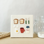小さな刺繍パネル《あさごはん》