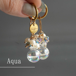 Aqua — 水滴ガラスの揺れるピアス／イヤリング（お水入り・透明感）　チタン変更OK アレルギー対応　クリスマス　冬
