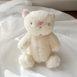 心をほぐす、ほほえみネコのぬいぐるみ
