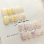 ゆめかわ手描きリボンチェックネイル（黄色、オレンジ、紫、ピンク、白）