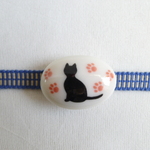 黒猫と足跡模様の帯留め（三分紐用）