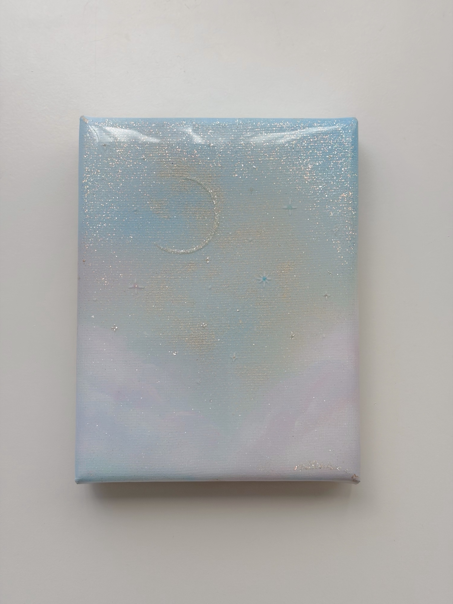 Rainbow clad moon
