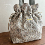 インド刺繍のレザー巾着バッグ