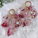 plum color♬.*ﾟキラキラ✨リボンとくまさんメロンパンキーホルダー  レジンキーホルダー 