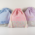 【名入れ刺繍】給食袋　★リバティ生地使用　入園入学グッズ　巾着　おむつポーチ　お名前刺繍