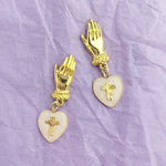lady hands pierce heart