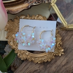 《wreath》aurora clear お花スパンコールのフープピアス ／イヤリング