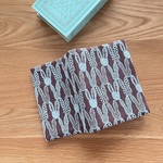 mina  perhonen pomppiaブックカバー    A6    ミナペルホネン の 刺繍生地　文庫本カバー
