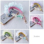 【再入荷 │ 人気デザイン】Petit denim ribbon フリルハンドストラップ｜5colors｜パラコード スマホストラップ