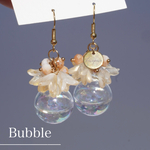 Bubble Bloom｜ガラスドーム フラワー 揺れる ピアス イヤリング サージカルステンレス316 変更可 アレルギー対応 大ぶり 透明感 ギフト　プレゼント　入園式　入学式　卒園式　卒業式