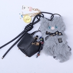 パスポートをもって海外旅行にいくニャンコのモールドールキーホルダー　猫　ミニバッグ　モールドール　モールドールチャーム　モールドールキーホルダー　ジャラキー キーホルダー ジャラジャラ じゃらじゃら 