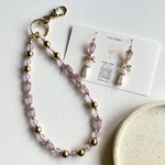 【みー様専用】💜ピアス＆ストラップセット