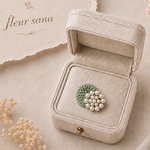 unique motif  シルキーパールとクロッシェのブローチ〈round〉mint green