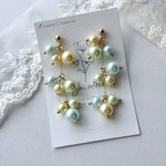 【 ミニシュシュ 】 ベージュ × 紫のお花