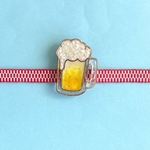 華やかな泡の輝く生ビール帯留