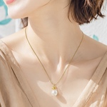豚に真珠 ？の ユニーク な ネックレス