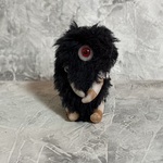黒いポワポワ