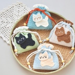ねこちゃんの巾着　ミニ巾着　かぎ針編み　巾着袋　イアホンケース　アクセサリーポーチ　小物入れ　編み物　ハンドメイド　プチギフト　誕生日　プレゼント
