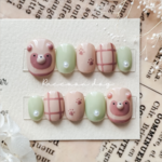 【サイズオーダー】ほっこりたぬきのブラウンネイルチップ（ベリーショート/ショートオーバル/動物）