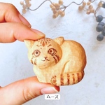 木彫りのマグネット　マヌルネコ