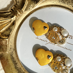 ビタミンカラーの💛ハートのアシメボタン　ピアス　and イヤリング
