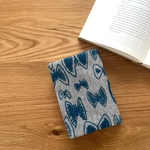 ミナペルホネン　ブックカバー   sky  flower  mina perhonen  の刺繍生地　文庫本カバー　しおりはオプションです