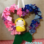 レインコートの雪だるまちゃんと紫陽花のリース
