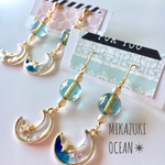 三日月オーシャン✴︎ピアス（イヤリング）/星/アシンメトリー/ゴールド/キラキラ/クリスタル/魔法/レジン/月/チェコパール/海/グラデーション/ラメ/ゆらゆら揺れる