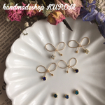リボンbijou樹脂ピアス(ブルー系)