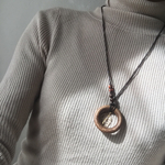 【monokli.woody】ウッドアロマネックレス "haste not rest not"   