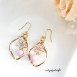 ツイストフラワーピアス／イヤリング ピンク