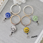 新色！スワロフスキーデコ♡ニコちゃんリールキー♪キラキラ大人可愛い