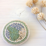 ビーズ刺繍の楕円ブローチ