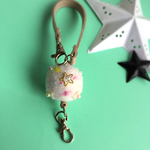 星が散りばむプラネットリール付きキーチェーン
