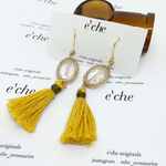 mustard tussle with  clear beads ピアス（イヤリング）