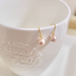 桜色小さめコットンパールの一粒ピアス