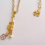【再々販】花咲くトランペット♪★花×金管楽器★ゴールド色★ネックレス他