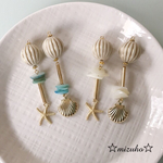 シェルのアシンメトリー 大ぶりピアス/イヤリング