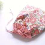 フリルがかわいいきんちゃく袋*リバティBetsyアプリコットピンク