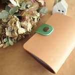 toconomaさまオーダー品　本革　ヌメ革で作った24ポケットあるカードケース（ターコイズ）