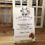 ラベンダー色リースのカフェボード