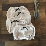リネンのくすみピンクのかぼちゃパンツ