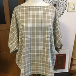 ドルマン袖口のトップス